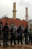 Police Upside Down at Coal Power Plant